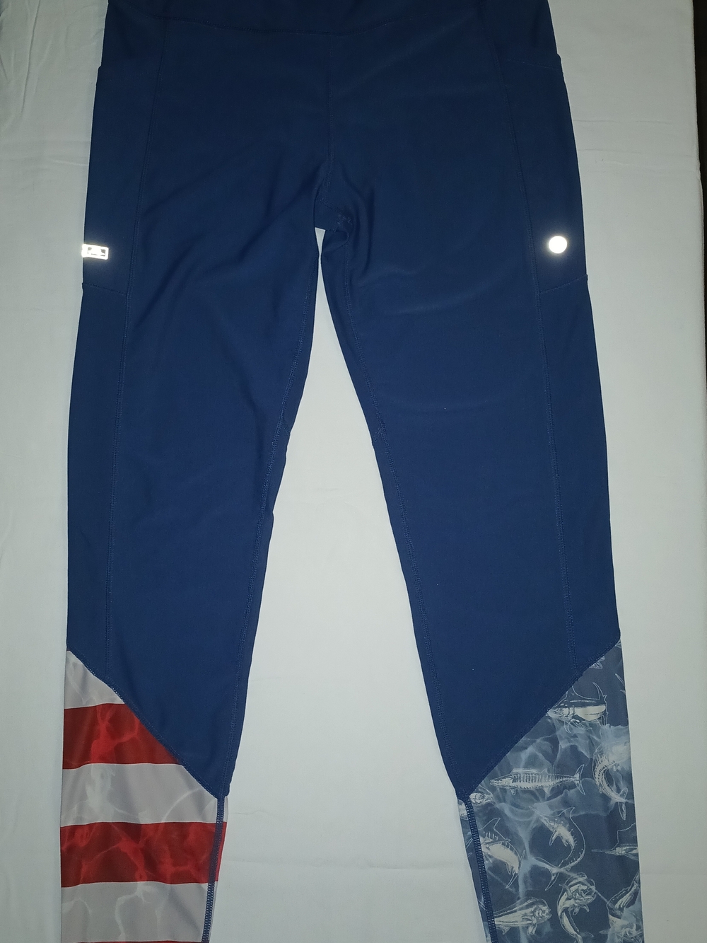 Pelagic UPF 50+ Protection Blue Athletic Leggings with Flag and Fish Accent